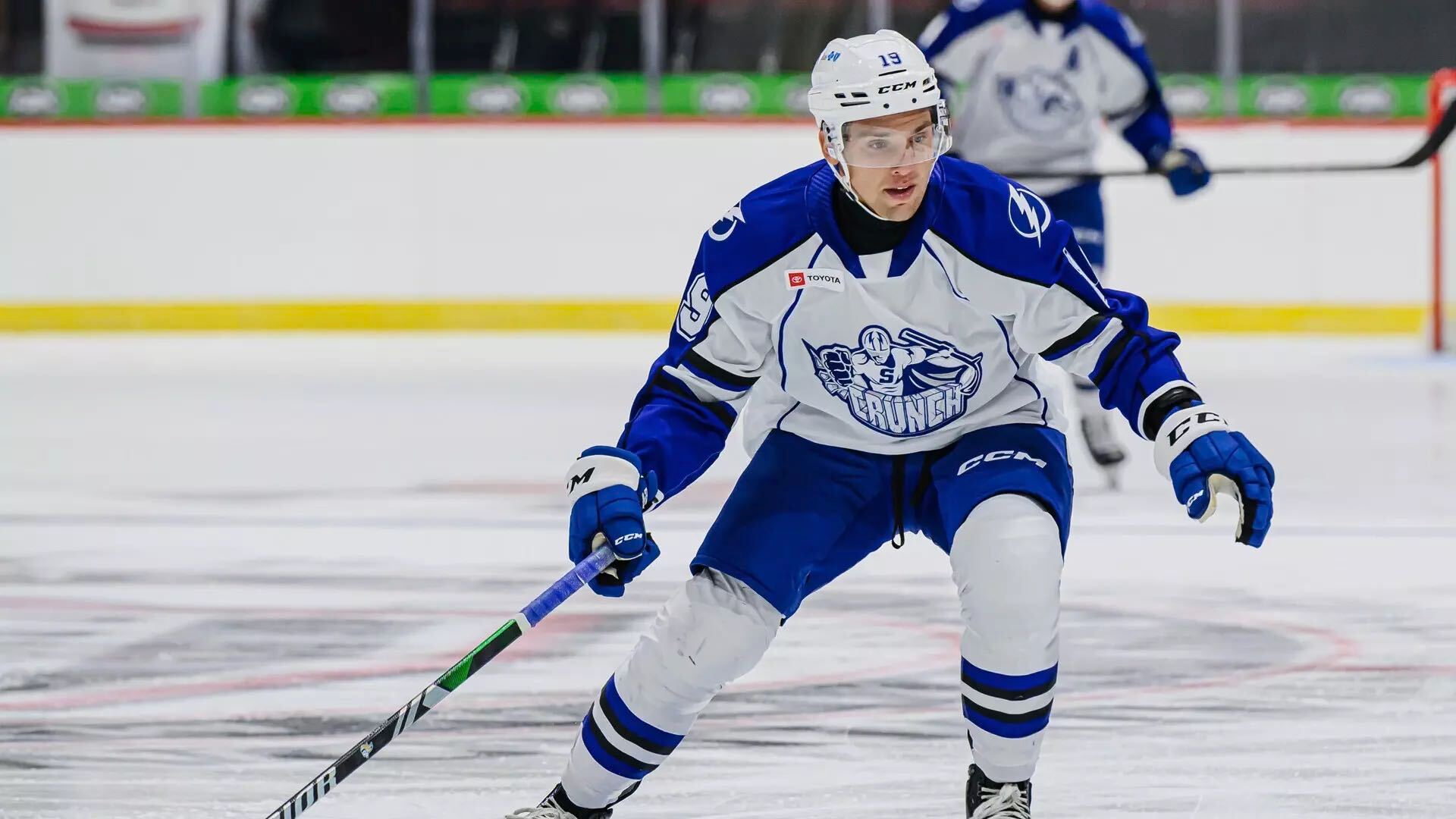 Hockey player moving through open ice during game action